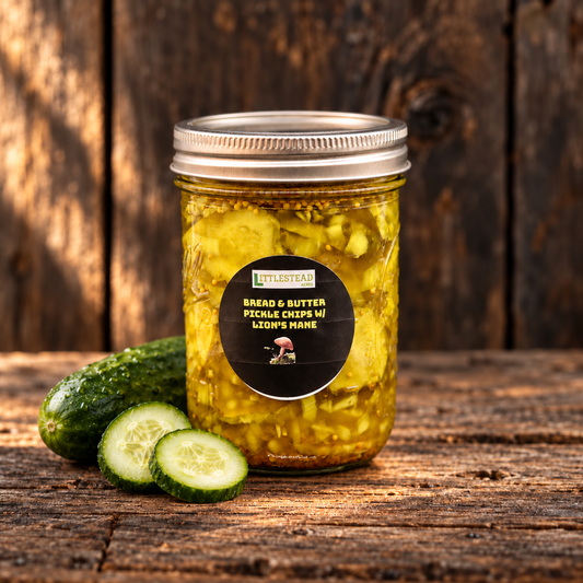 Pickles, Lion’s Mane Bread and Butter Chips with matching ingredient accents on a rustic wood table